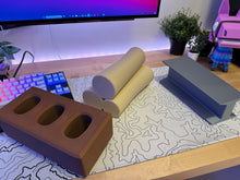 Giant Building Material Props – Metal, Wood & Brick Gaming Mats