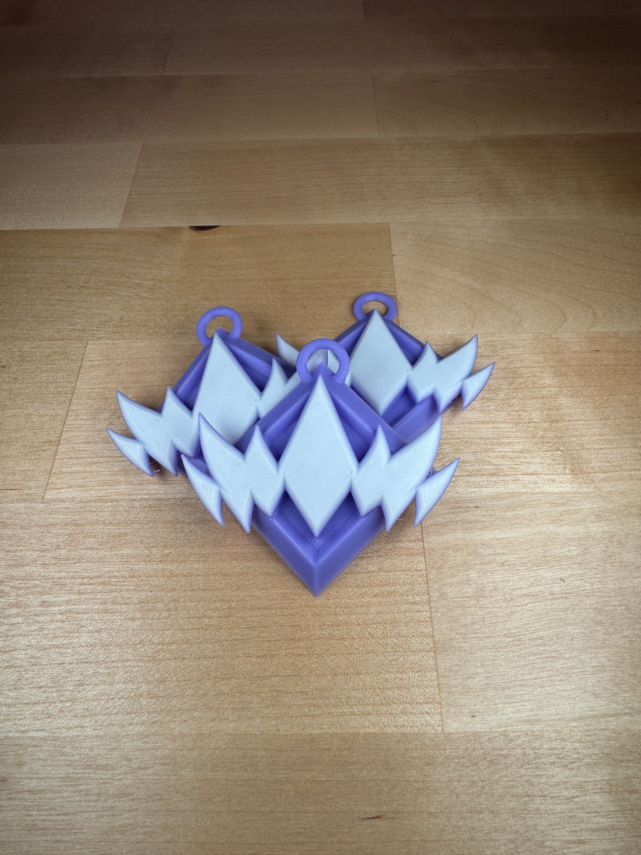 Fortnite Unreal Rank keychain front view, full color